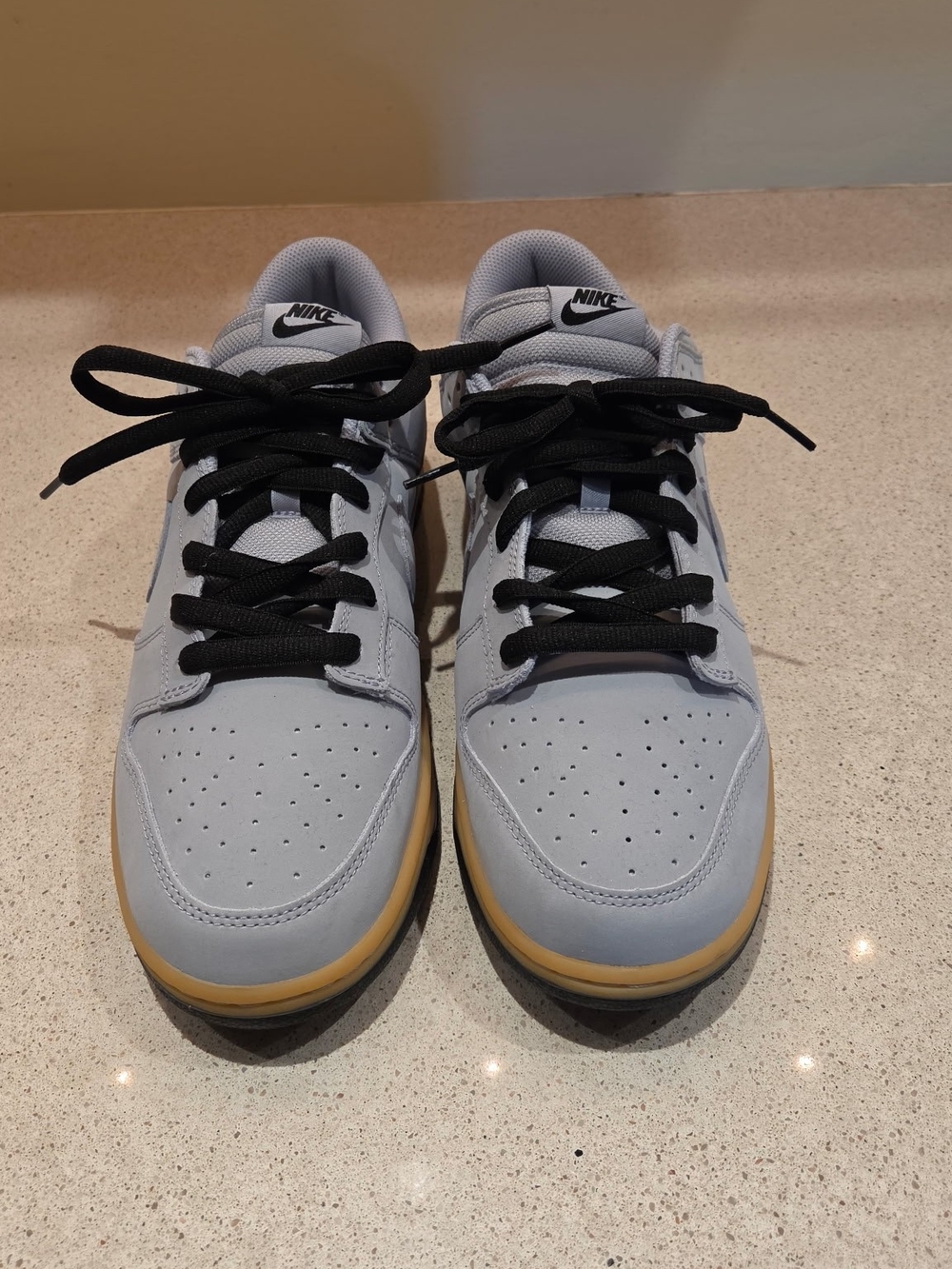 Nike Men’s Light Gray Sneakers with Black Laces and Gum Sole